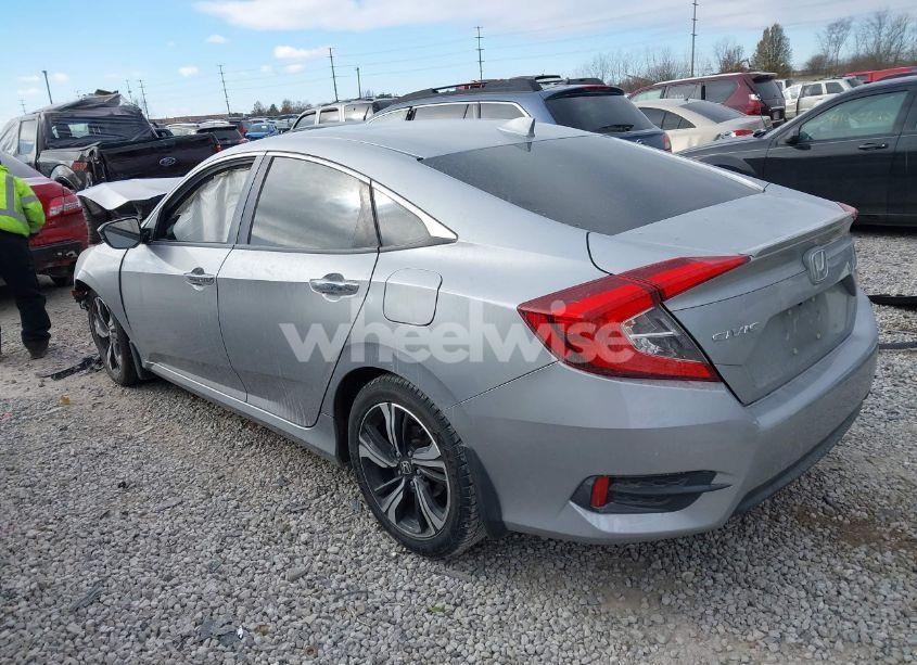 Photo 3 of 2017 Honda Civic TOURING (VIN 19XFC1F92HE014305)