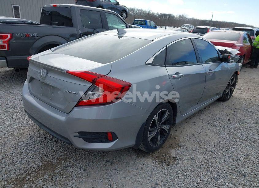 Photo 4 of 2017 Honda Civic TOURING (VIN 19XFC1F92HE014305)