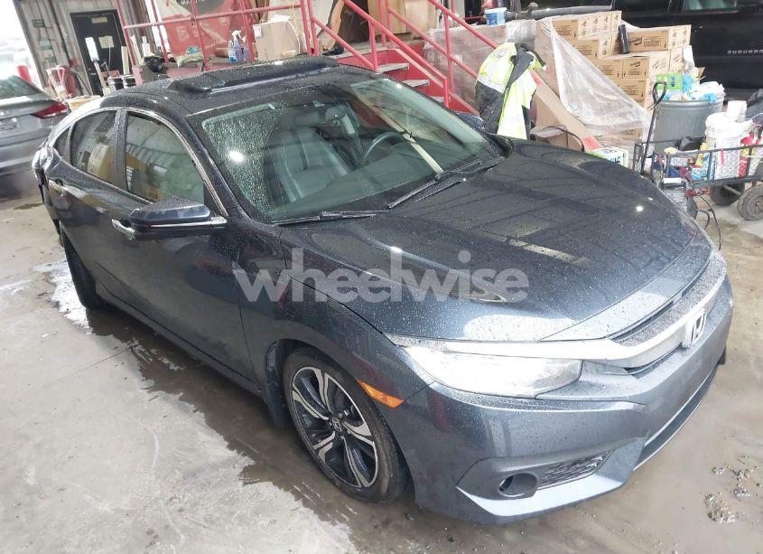 2016 Honda Civic TOURING (VIN 19XFC1F94GE014496) main photo
