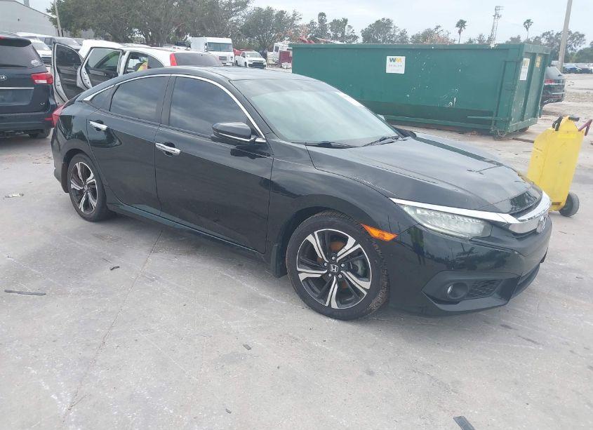 2016 Honda Civic TOURING (VIN 19XFC1F94GE024445) main photo
