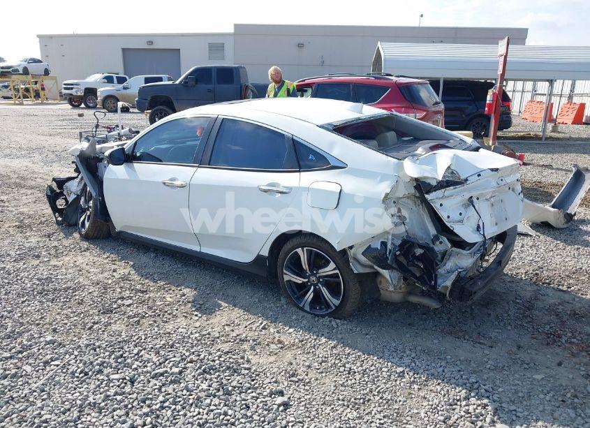 Photo 3 of 2016 Honda Civic TOURING (VIN 19XFC1F94GE028933)