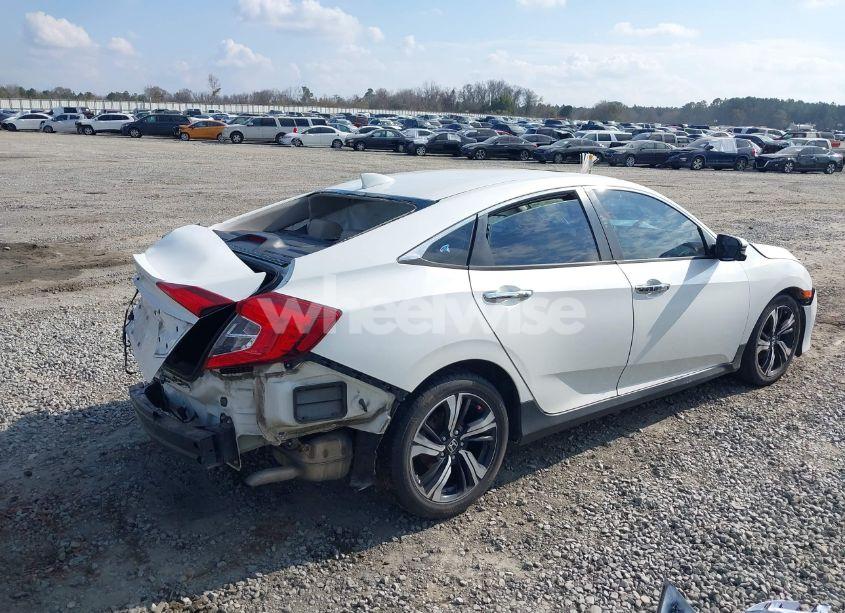 Photo 4 of 2016 Honda Civic TOURING (VIN 19XFC1F94GE028933)