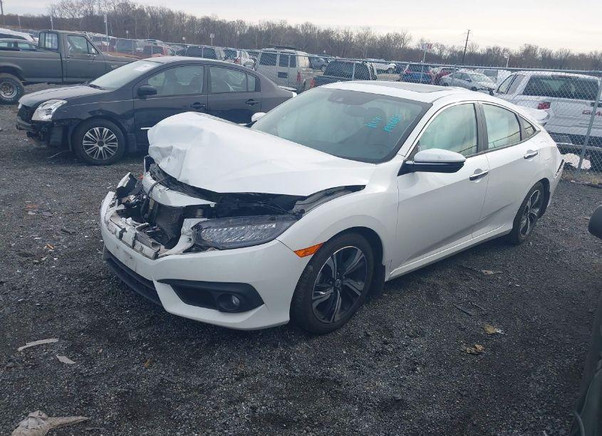 Photo 2 of 2017 Honda Civic TOURING (VIN 19XFC1F94HE210066)