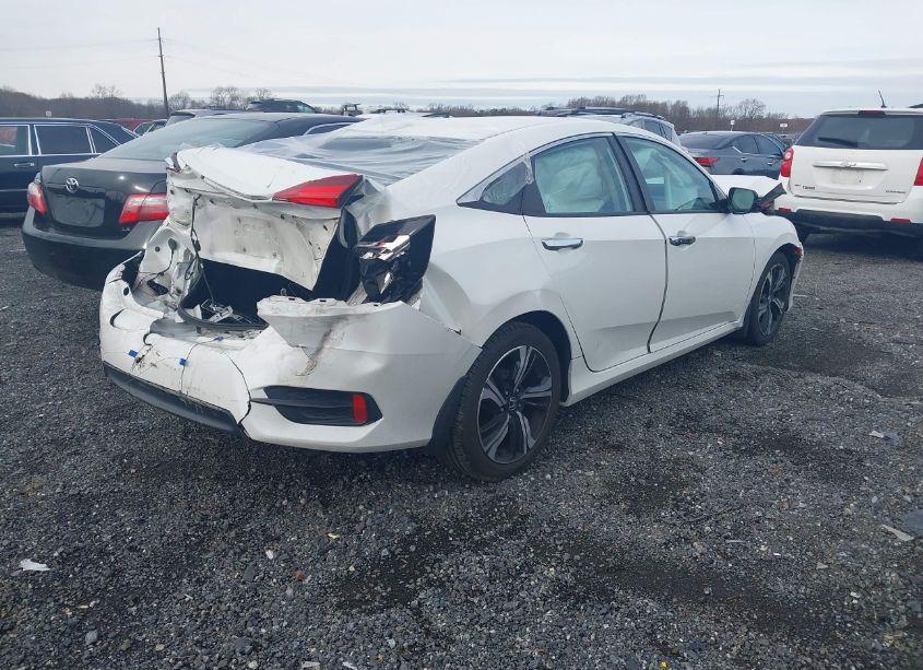 Photo 4 of 2017 Honda Civic TOURING (VIN 19XFC1F94HE210066)