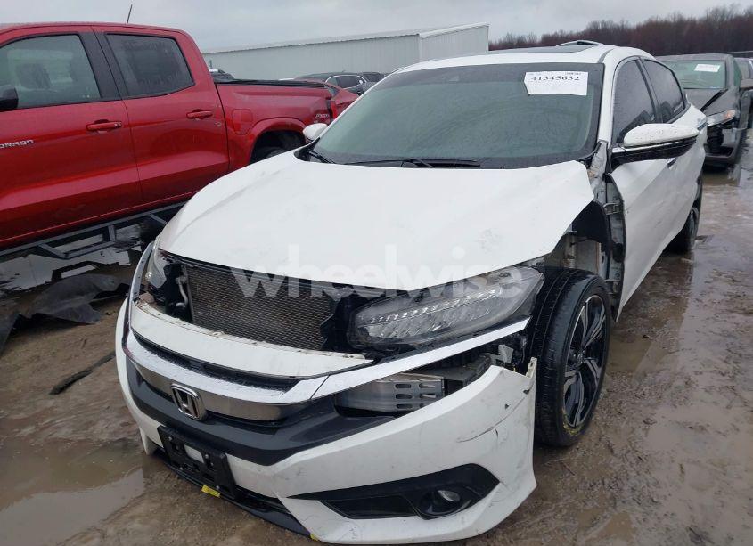 Photo 2 of 2017 Honda Civic TOURING (VIN 19XFC1F95HE023192)