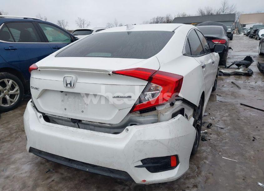 Photo 4 of 2017 Honda Civic TOURING (VIN 19XFC1F95HE023192)
