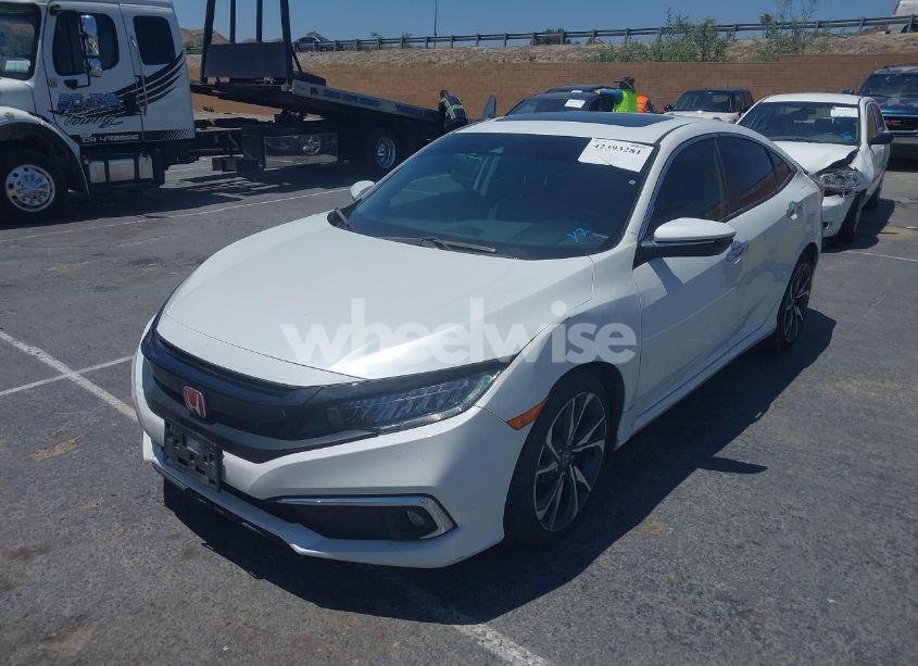 Photo 2 of 2021 Honda Civic TOURING (VIN 19XFC1F95ME202228)