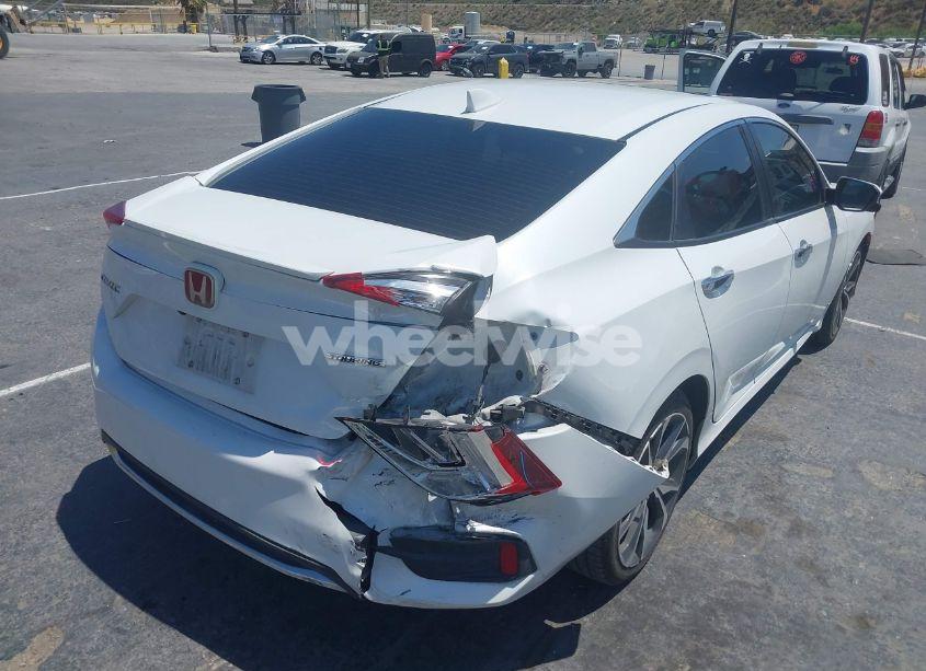 Photo 6 of 2021 Honda Civic TOURING (VIN 19XFC1F95ME202228)
