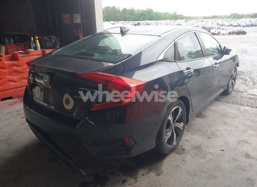 Photo 4 of 2016 Honda Civic TOURING (VIN 19XFC1F96GE013124)