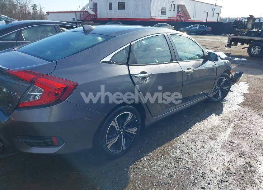 Photo 4 of 2017 Honda Civic TOURING (VIN 19XFC1F96HE201367)