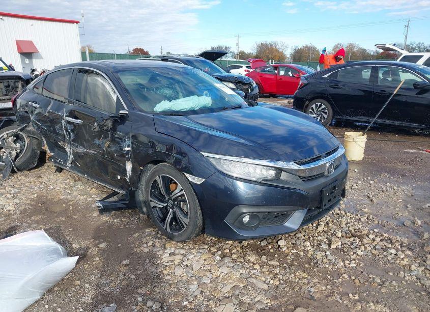 2016 Honda Civic TOURING (VIN 19XFC1F97GE002682) main photo
