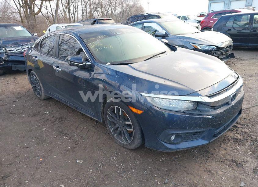 2016 Honda Civic TOURING (VIN 19XFC1F97GE011768) main photo