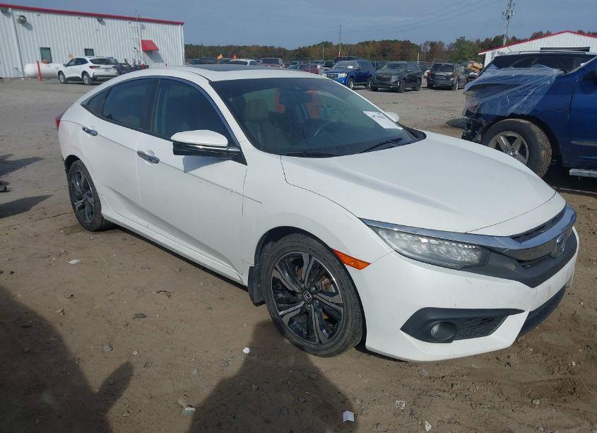 2016 Honda Civic TOURING (VIN 19XFC1F97GE016744) main photo