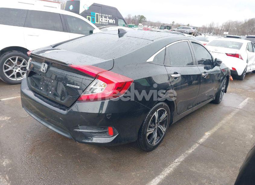 Photo 4 of 2016 Honda Civic TOURING (VIN 19XFC1F97GE202283)