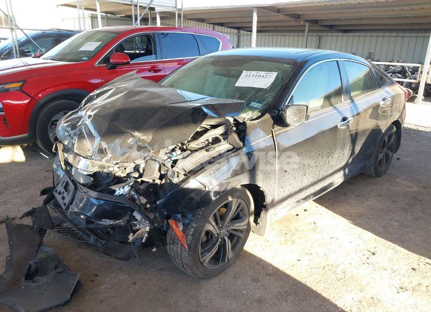 Photo 2 of 2017 Honda Civic TOURING (VIN 19XFC1F97HE010119)