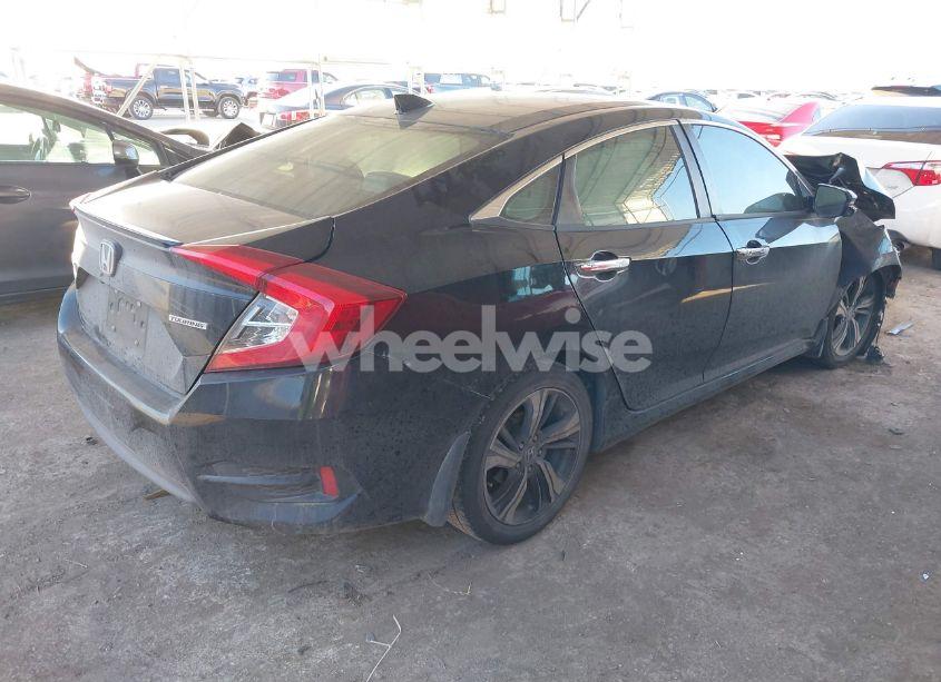 Photo 4 of 2017 Honda Civic TOURING (VIN 19XFC1F97HE010119)