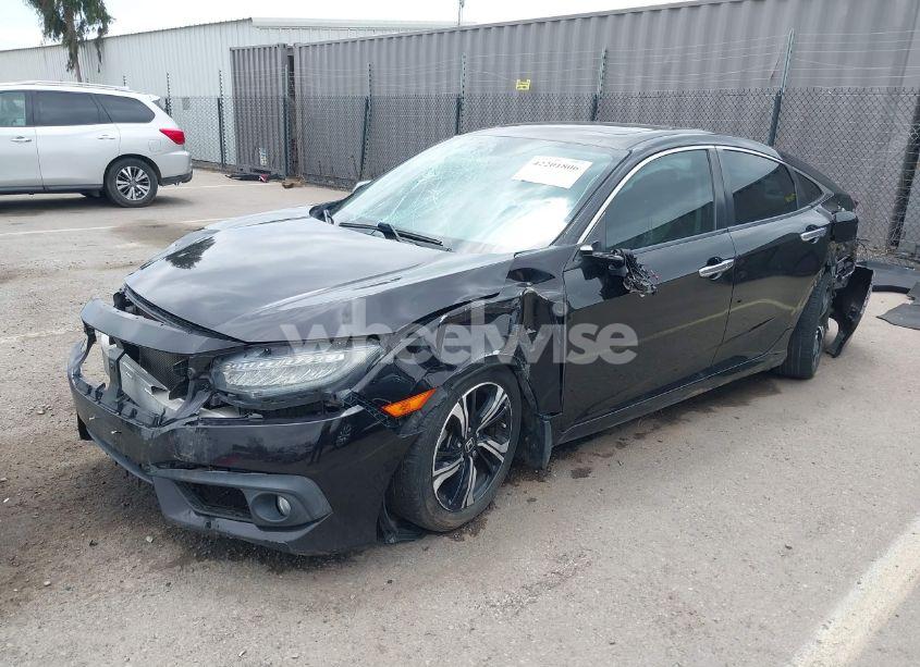 Photo 2 of 2017 Honda Civic TOURING (VIN 19XFC1F97HE011349)