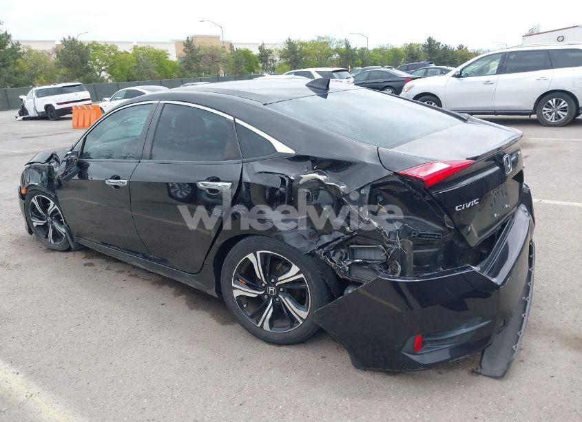 Photo 3 of 2017 Honda Civic TOURING (VIN 19XFC1F97HE011349)