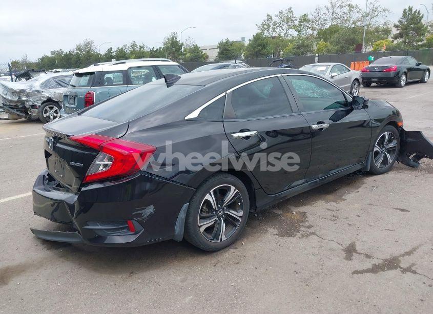 Photo 4 of 2017 Honda Civic TOURING (VIN 19XFC1F97HE011349)