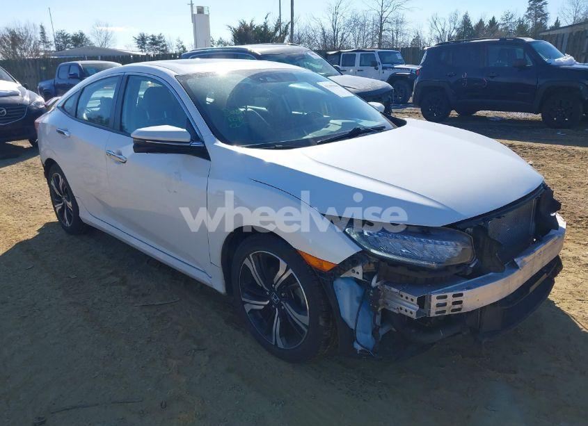 2017 Honda Civic TOURING (VIN 19XFC1F97HE015398) main photo