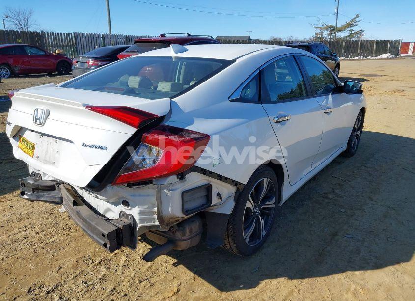 Photo 4 of 2017 Honda Civic TOURING (VIN 19XFC1F97HE015398)