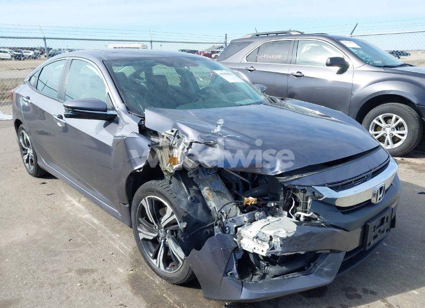 2017 Honda Civic TOURING (VIN 19XFC1F99HE007058) main photo