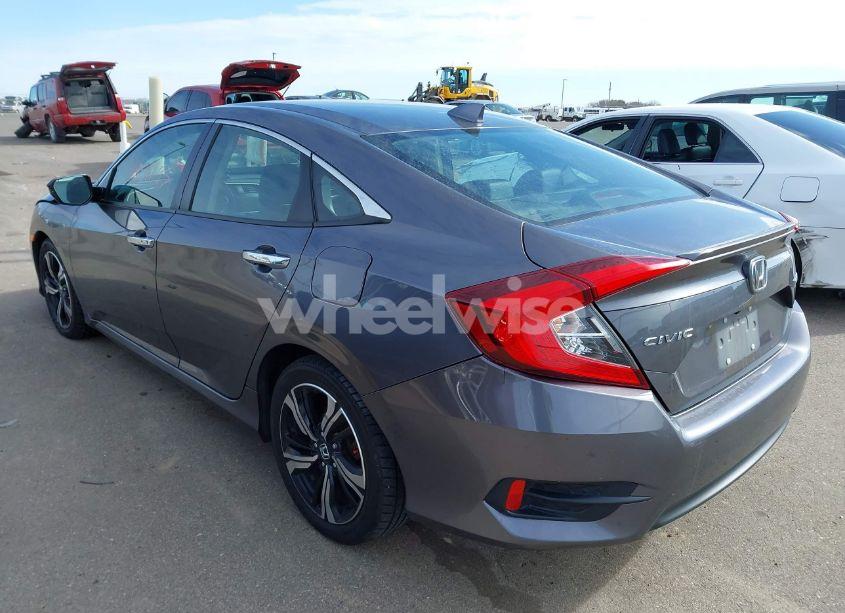 Photo 3 of 2017 Honda Civic TOURING (VIN 19XFC1F99HE007058)