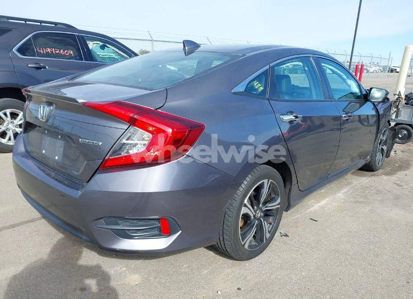 Photo 4 of 2017 Honda Civic TOURING (VIN 19XFC1F99HE007058)