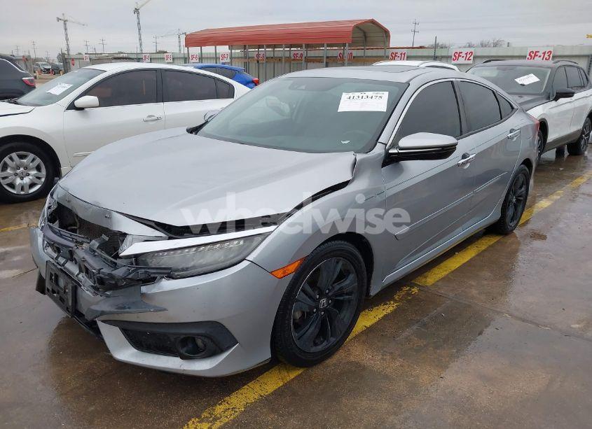 Photo 2 of 2017 Honda Civic TOURING (VIN 19XFC1F99HE018898)