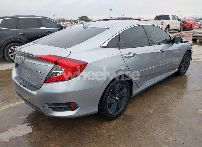 Photo 4 of 2017 Honda Civic TOURING (VIN 19XFC1F99HE018898)