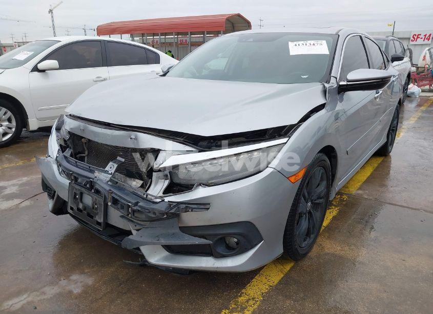 Photo 6 of 2017 Honda Civic TOURING (VIN 19XFC1F99HE018898)