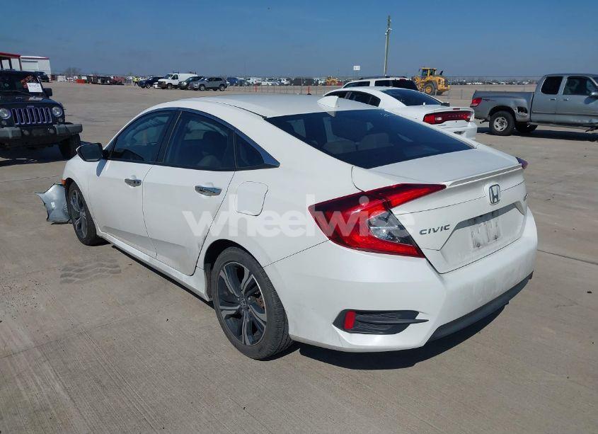 Photo 3 of 2017 Honda Civic TOURING (VIN 19XFC1F99HE030484)