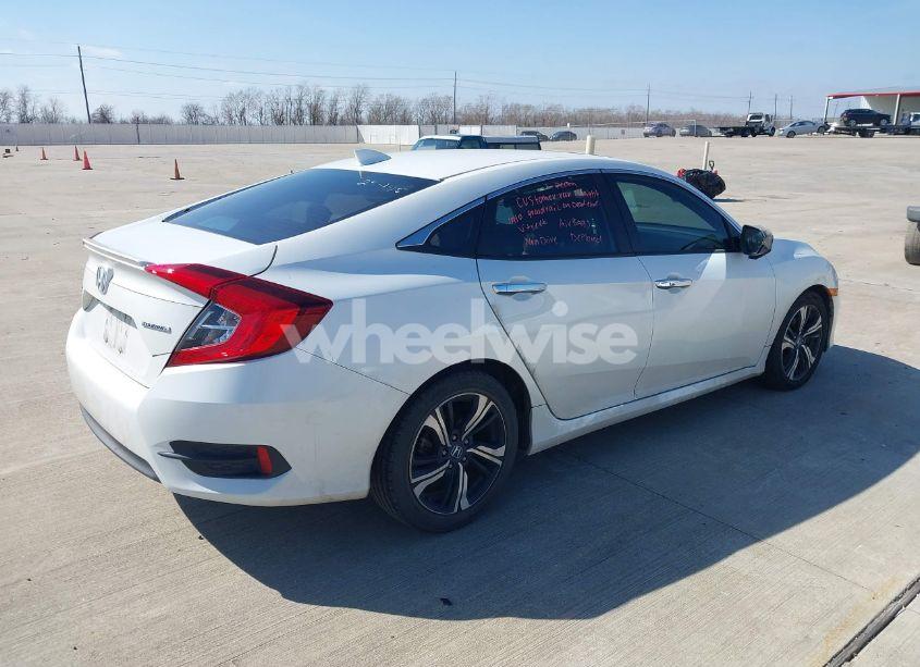 Photo 4 of 2017 Honda Civic TOURING (VIN 19XFC1F99HE030484)