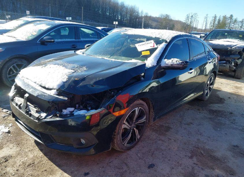 Photo 2 of 2017 Honda Civic TOURING (VIN 19XFC1F99HE202464)