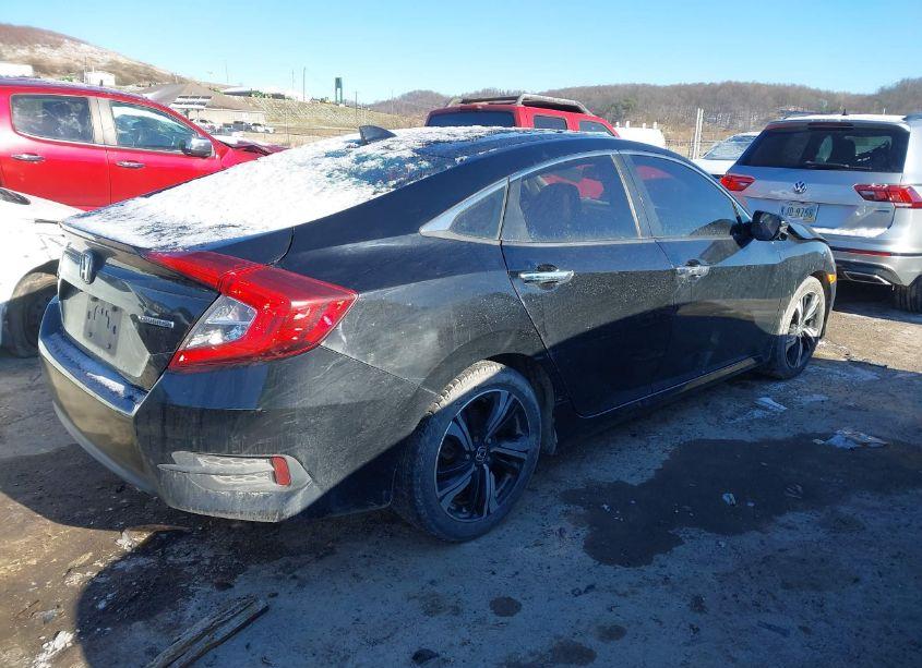 Photo 4 of 2017 Honda Civic TOURING (VIN 19XFC1F99HE202464)