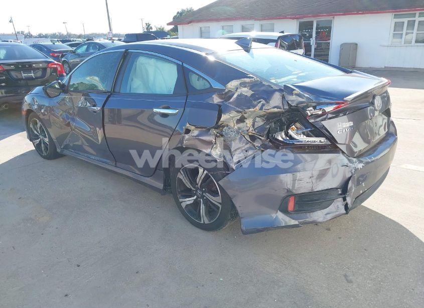 Photo 3 of 2016 Honda Civic TOURING (VIN 19XFC1F9XGE210457)