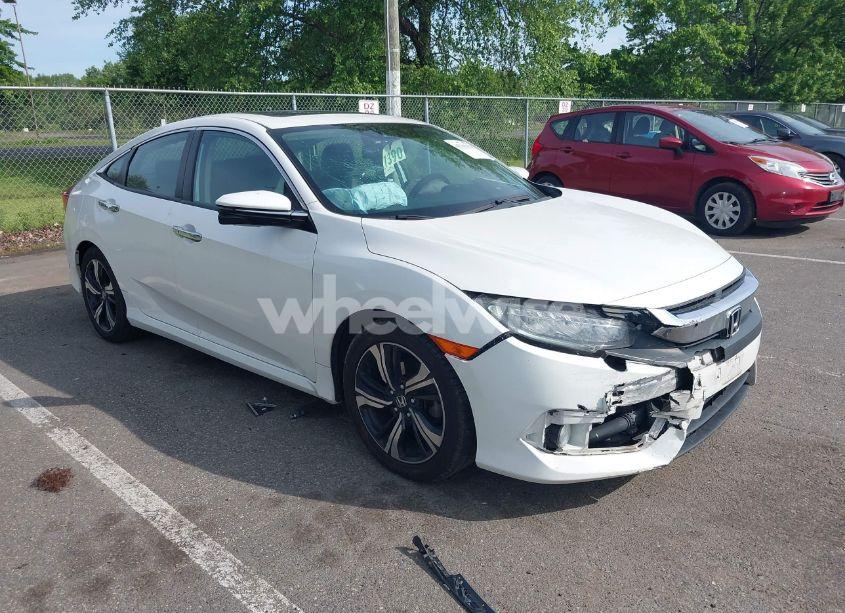 2016 Honda Civic TOURING (VIN 19XFC1F9XGE224035) main photo