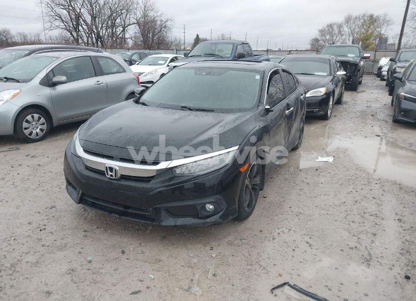 Photo 2 of 2017 Honda Civic TOURING (VIN 19XFC1F9XHE010924)