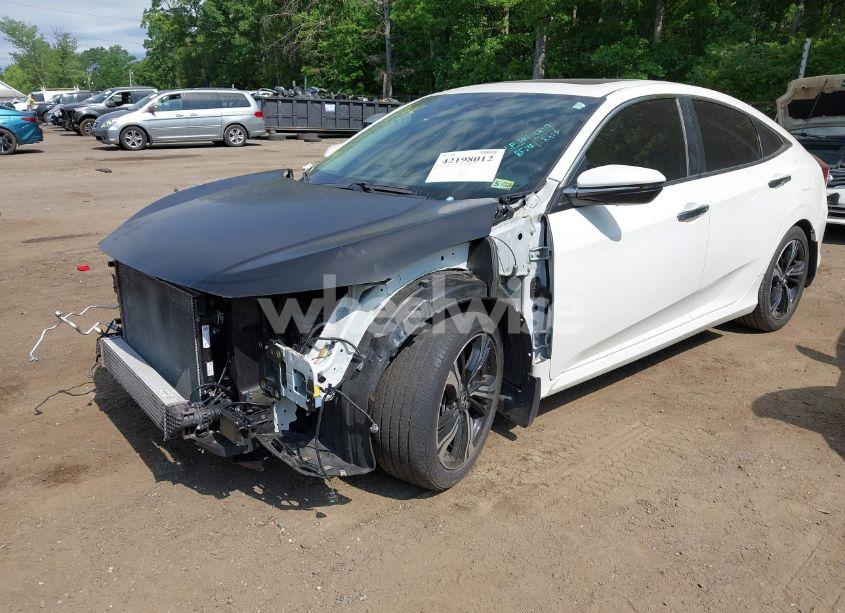 Photo 2 of 2017 Honda Civic TOURING (VIN 19XFC1F9XHE032566)