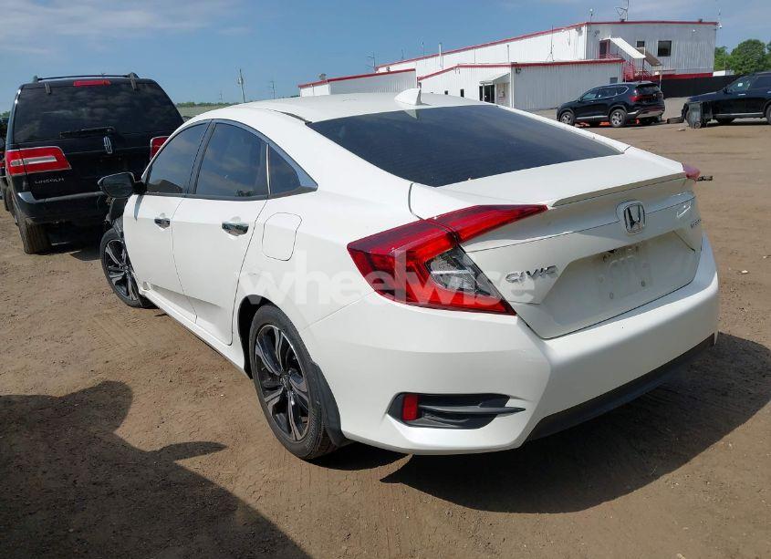 Photo 3 of 2017 Honda Civic TOURING (VIN 19XFC1F9XHE032566)
