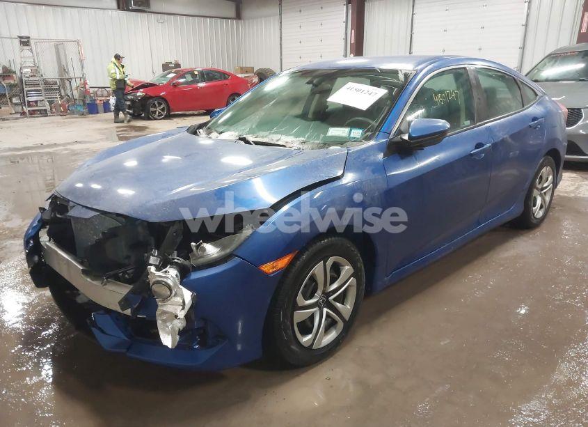 Photo 2 of 2018 Honda Civic LX (VIN 19XFC2E50JE016872)
