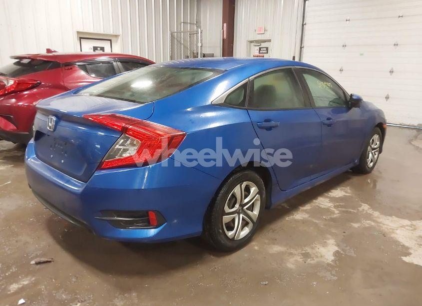 Photo 4 of 2018 Honda Civic LX (VIN 19XFC2E50JE016872)