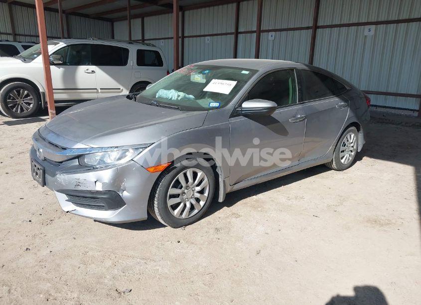 Photo 2 of 2017 Honda Civic LX (VIN 19XFC2E51HE072216)