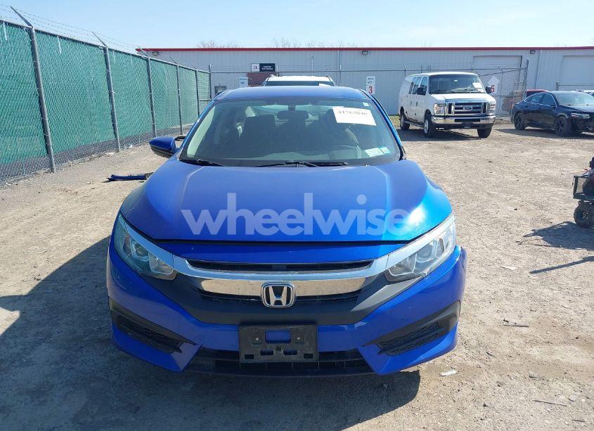 Photo 12 of 2018 Honda Civic LX (VIN 19XFC2E51JE000549)