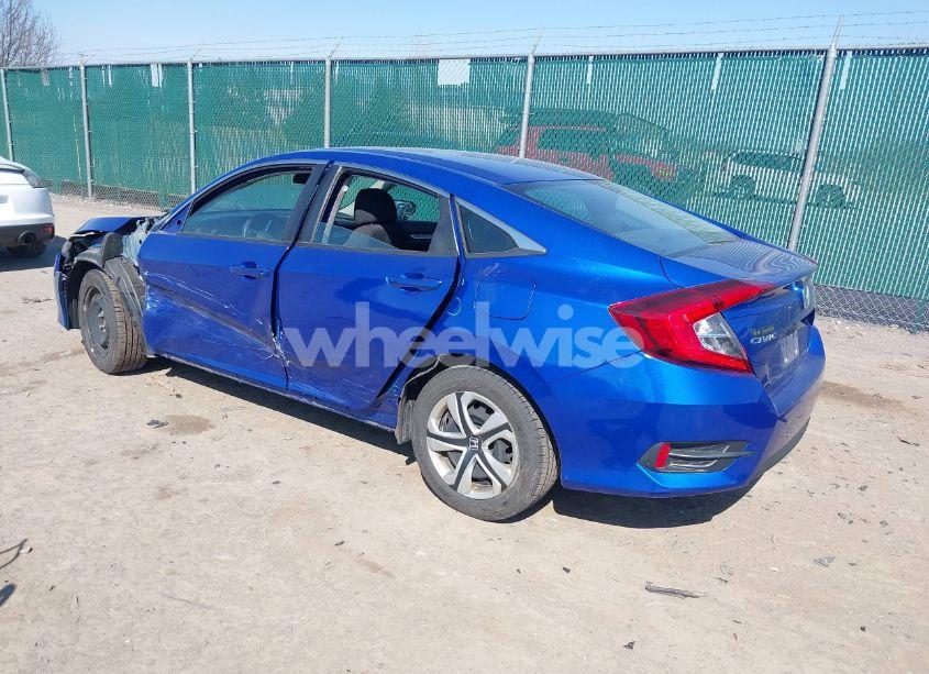 Photo 3 of 2018 Honda Civic LX (VIN 19XFC2E51JE000549)
