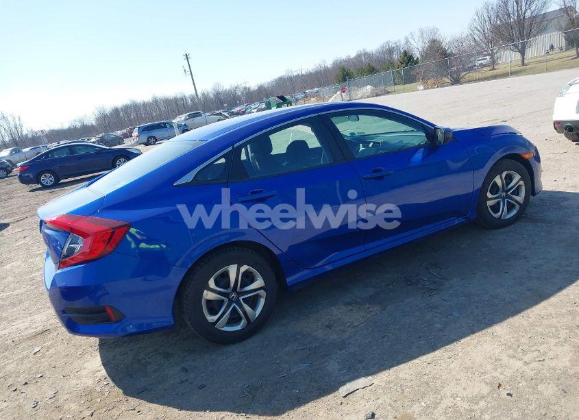 Photo 4 of 2018 Honda Civic LX (VIN 19XFC2E51JE000549)