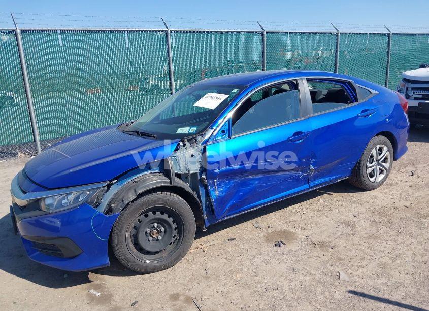 Photo 6 of 2018 Honda Civic LX (VIN 19XFC2E51JE000549)