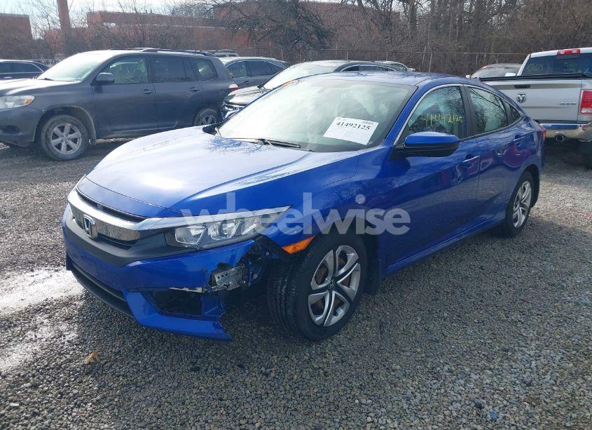 Photo 2 of 2017 Honda Civic LX (VIN 19XFC2E52HE079241)