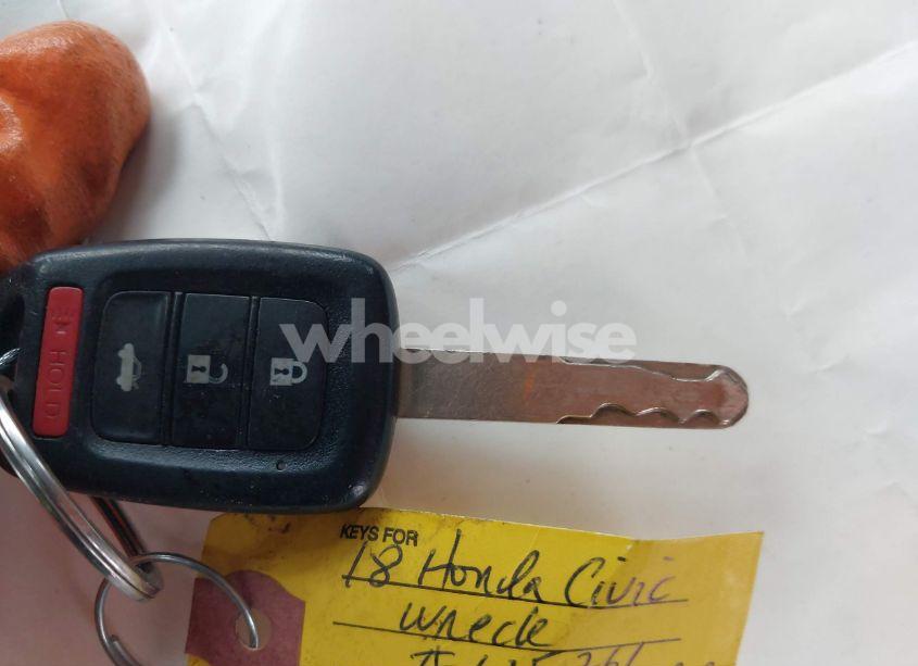 Photo 11 of 2018 Honda Civic LX (VIN 19XFC2E52JE026061)