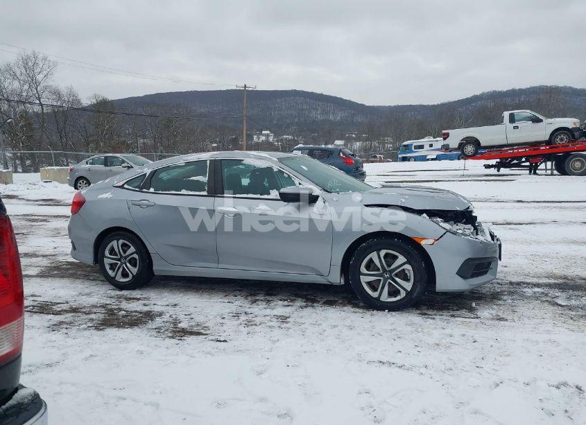 Photo 13 of 2018 Honda Civic LX (VIN 19XFC2E52JE026061)